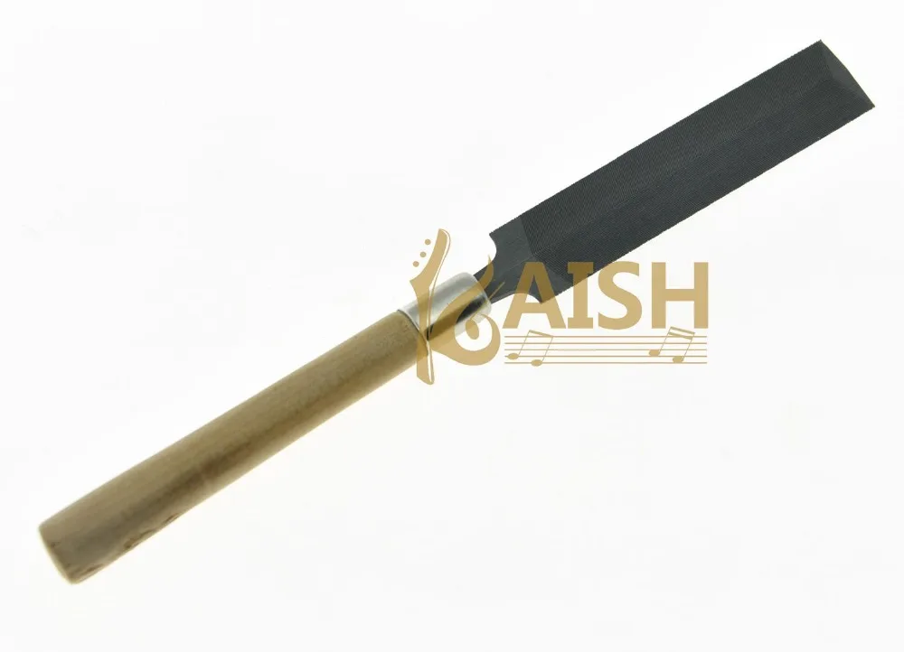 Bass guitar nut slots