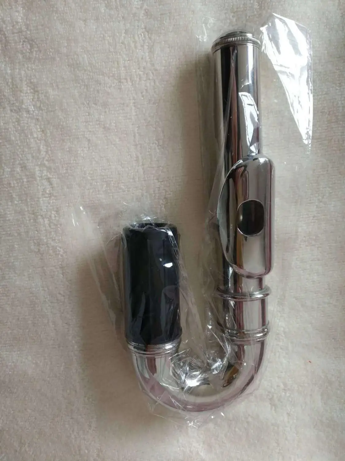 

Children's flute mouthpiece, Children's flute headjoint.Flute curved head, curved mouthpiece.Nickel plating.We also have silver-