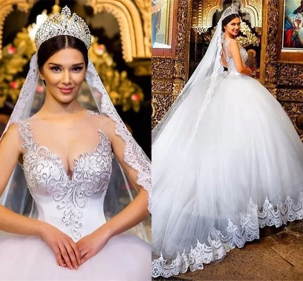 2018 Ball Gown Wedding Dresses Sheer Neckline Lace Applique Beads Crystal Sweetheart Hollow Back Court Back Plus Size Formal Bridal Gowns