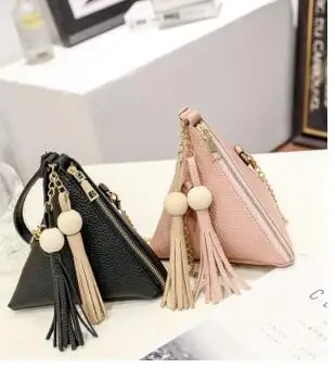 

2017 spring new triangular handbags Korean version of the tassel makeup bag handbag
