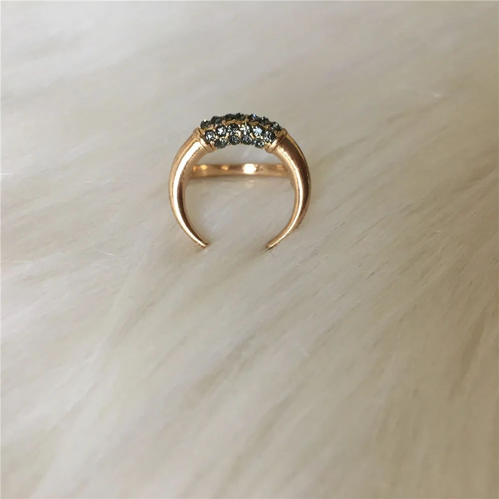 

Lovely gold color plating black stone paving horn shape ring for women