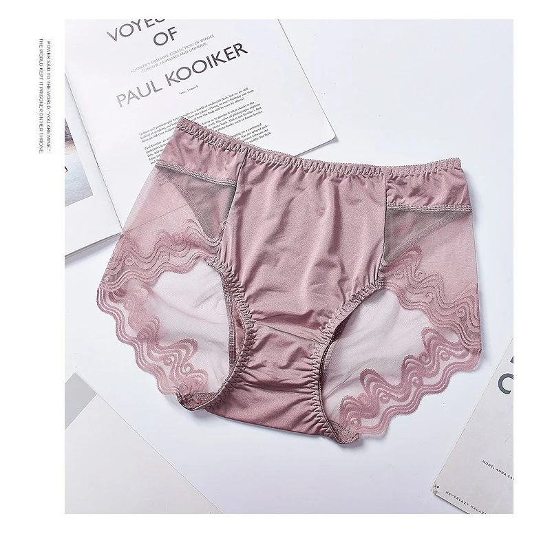 

New sexy underwear lady lace traceless transparent temptation in the waist lift hip triangle underwear cotton file