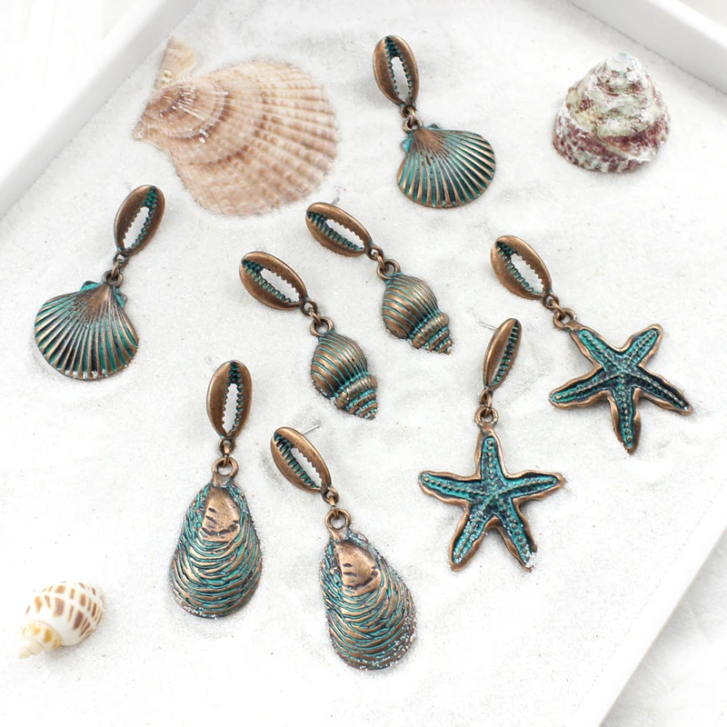 

Newest Brincos Eardrop Sandy beach Ocean wind style Drop Earrings Metal alloys Starfish shell Conch Crab vice fashion Jewellery