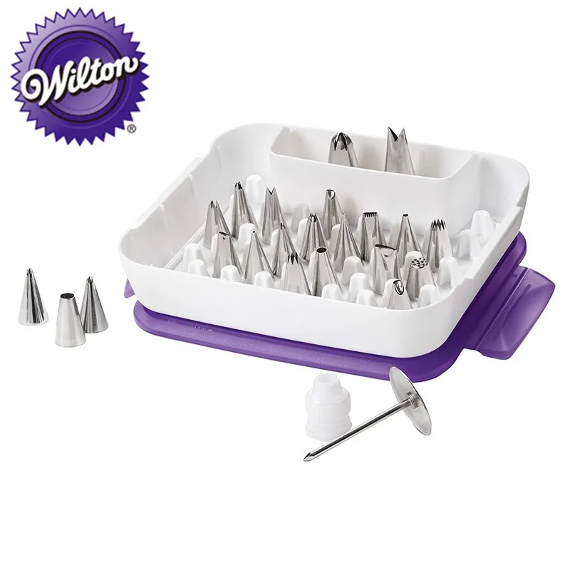 

Wilton Decorating Piping Tip Set - Cake Decorating Supplies Set with 22 Piece Icing Tips, 1 Standard Coupler, 1 Flower Nail