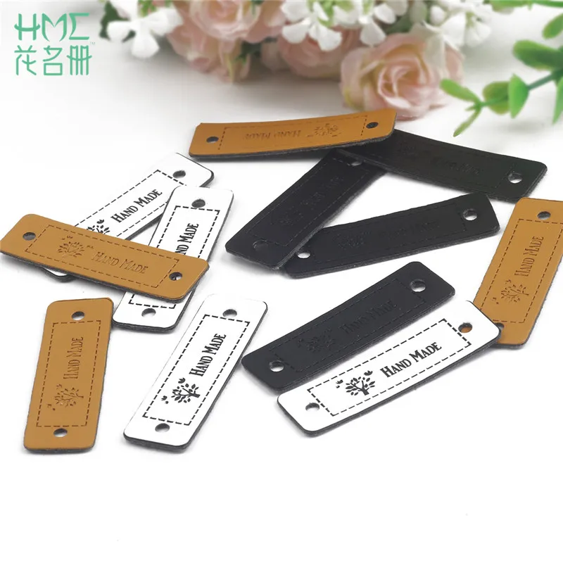 

High Quality 12pcs/lot 5x1.5cm Handmade PU Leather Tag Embossed Label For DIY Craft Garment Clothes Shoes Bag Sewing Accessories