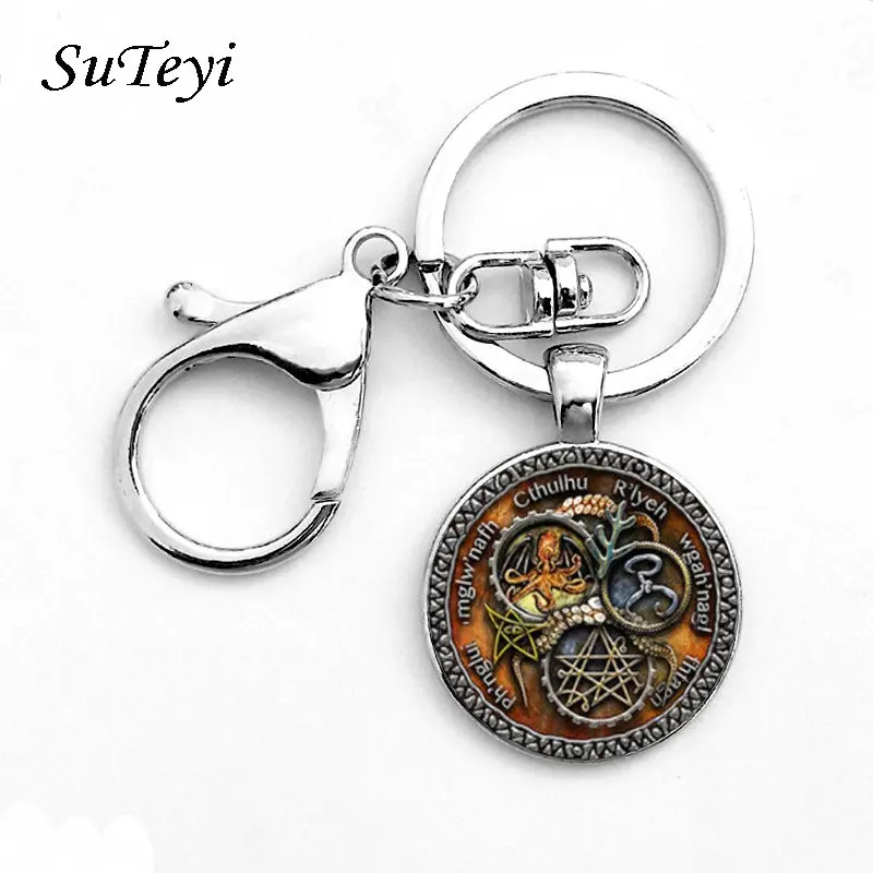 

Suteyi Vintage Cthulhu Symbol Key Chain With Hook Steam Punk Vinkling Letter Octopus Pattern Key Holder Women Men Jewelry