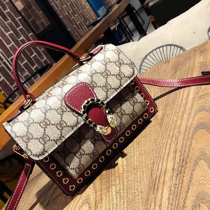 

Luxury brand women's bag 2018 new fashion Bacchus bag wild hit color hand strap shoulder slung small square bag designer