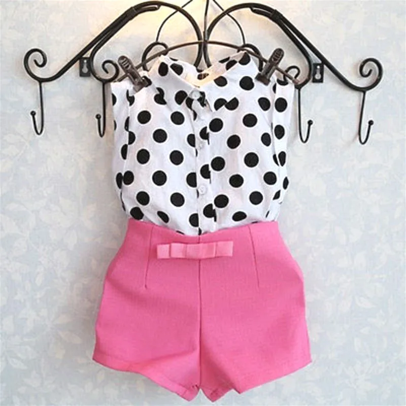 white shirt with pink polka dots