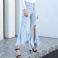 Модные расклешенные повседневные джинсовые брюки со средней талией, рваные джинсы, потертые брюки с дырками и кисточками, асимметричный подол, расклешенные винтажные джинсы