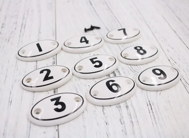 

Double-hole American multi-function ceramic multi-cabinet distinguishing hooks Arabic numerals handle wake up sign