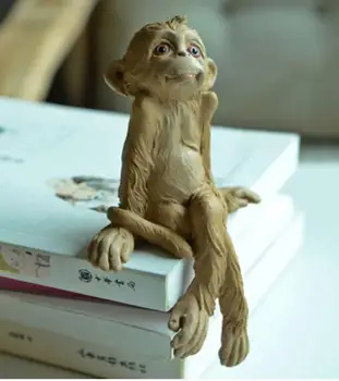 

Retro Nordic cartoon monkeys set out with a small creative pot on the table glass bookshelf lovely home animal props