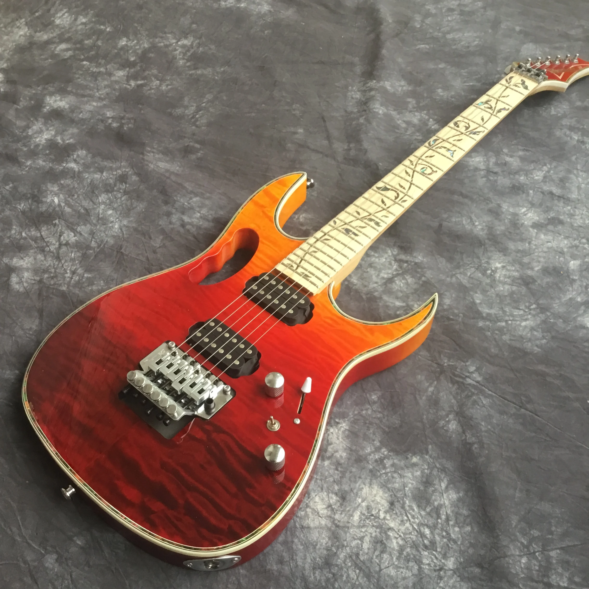 

High quality red and yellow electric guitar 6-string and vibrato, dual-wave electric guitar custom shop, free shippi