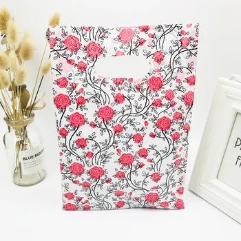 

20x30cm Clothes Packaging Plastic Bag Boutique 50pcs Red Rose Printing Plastic Handle Bag Christmas Gift Shopping