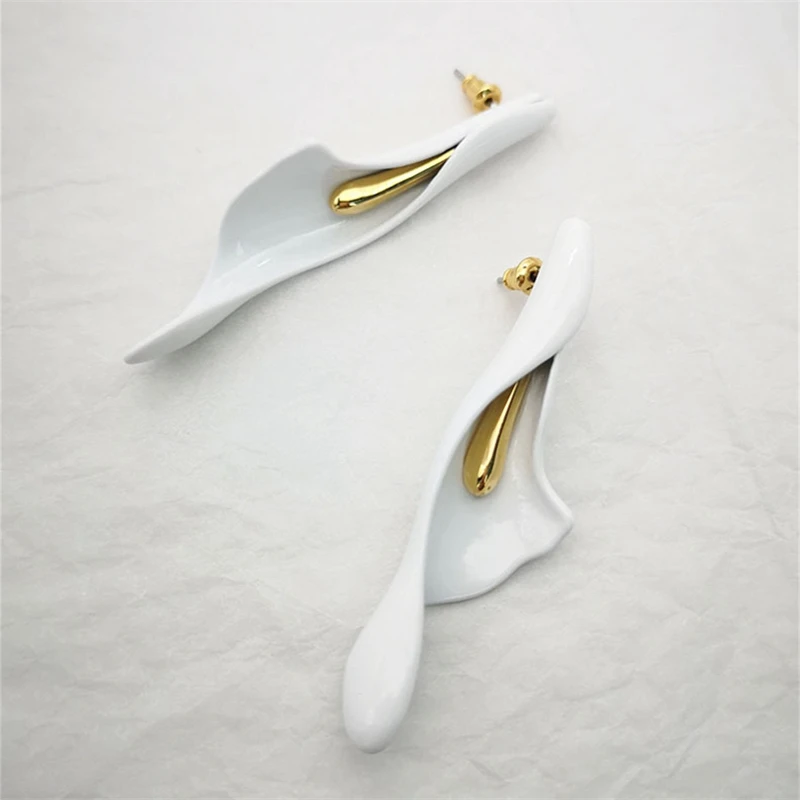 

European and American niche design white enamel earrings female exaggerated temperament personality retro cold wind French