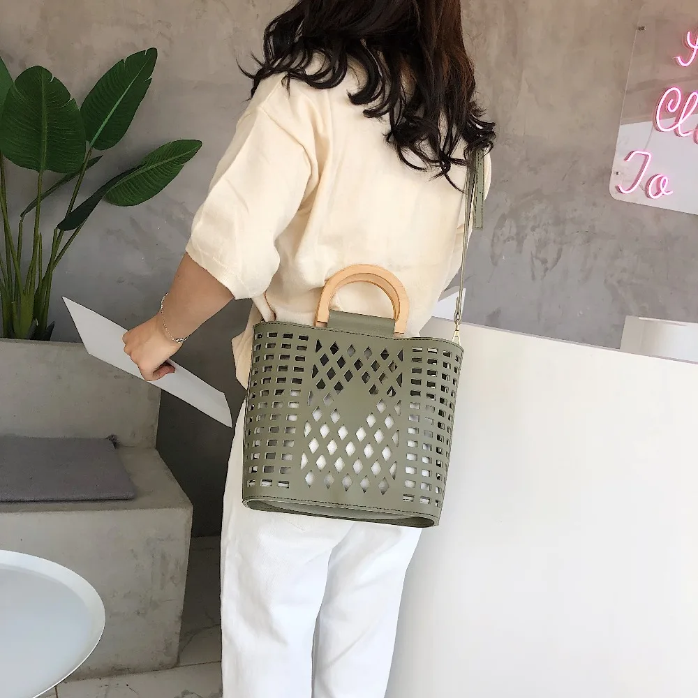 الجوف خارج حقيبة شاطئية للنساء 2019 الشهيرة العلامة التجارية سيدة الخشب مقبض حمل أكياس حقيبة كتف جلدية pu السفر المحافظ و حقائب الجوف خارج حقيبة شاطئية للنساء 2019 الشهيرة العلامة التجارية سيدة الخشب مقبض حمل أكياس حقيبة كتف جلدية pu السفر المحافظ و حقائب