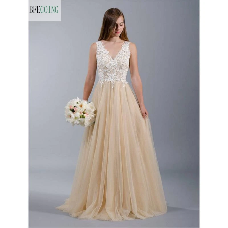 champagne and white lace wedding dress