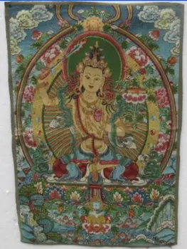 

A golden silk embroidery thangka goddess guanyin in Tibet and Nepal