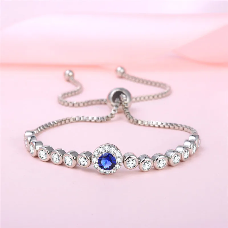 

Bright Big Blue Stone And Cubic Zirconia Plated White Gold Bracelets For Women Elegant And Trendy Adjustable Chain Bangle