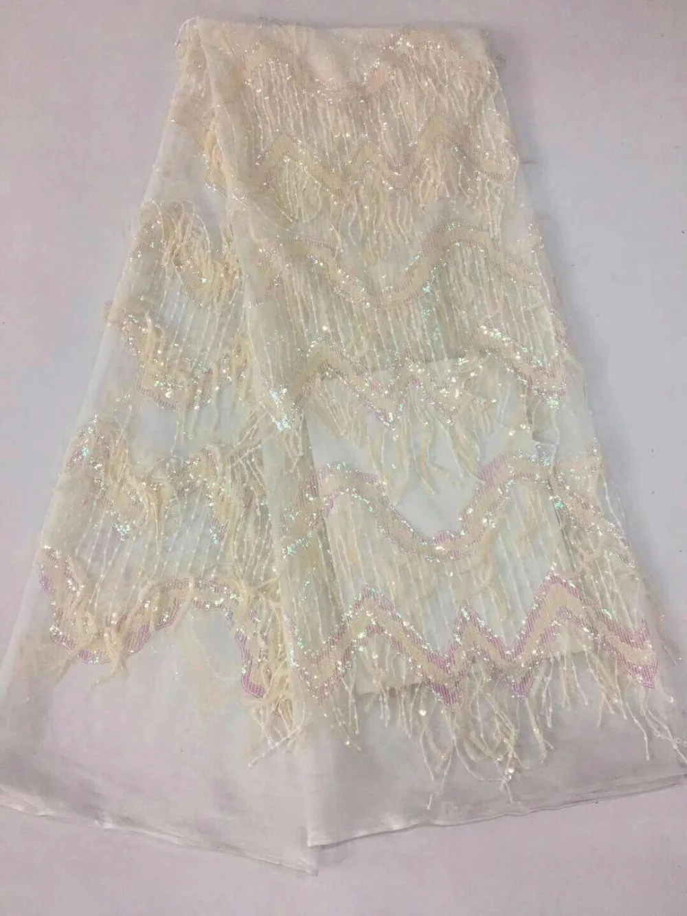 

Wholesale price of African feather tassel fabric high quality handmade, French sari lace has many 3D bright lace wedding dress