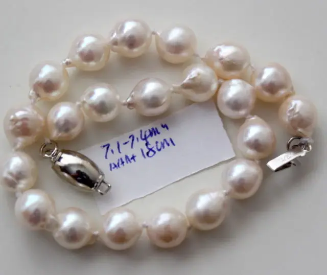 

10mm natural south seas white pearl bracelet silver clasp