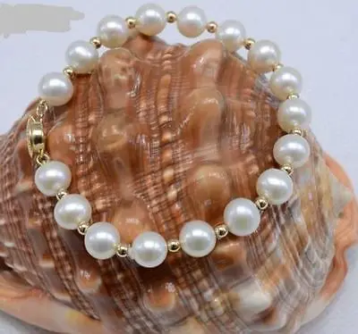 

Shipping >> 14K YELLOW GOLD CLASP WITH 10-11MM WHITE SOUTH SEA PEARL BRACELET 8" INCH