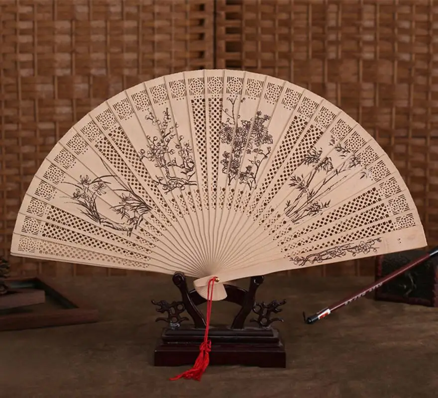 

2018 Smooth opening and closing Chinese Traditional Hollow Fan Wooden Hand Made Exquisite Folding Wedding Gift 2sw0809