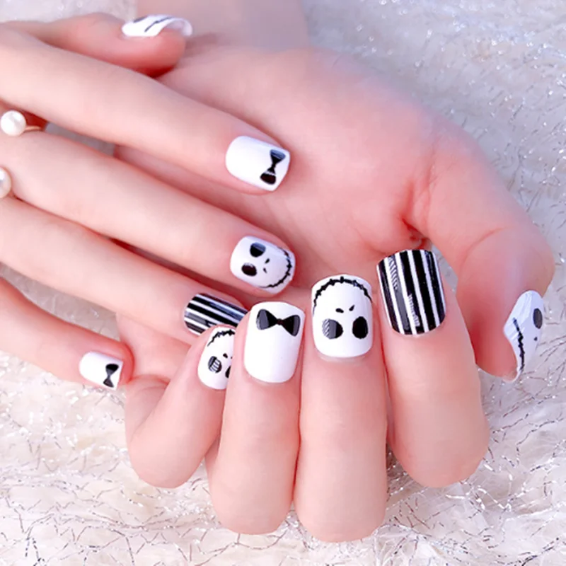 

24pcs Kawaii Skull False Nails Short Tips For Design Halloween Bow Tie Fake Nails With Glue Sticker Fingernails False Adhesive