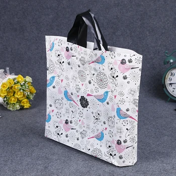 

50pcs Plastic hand bag clothing bag high grade plastic gift bag women's Shopping favors packing accessories