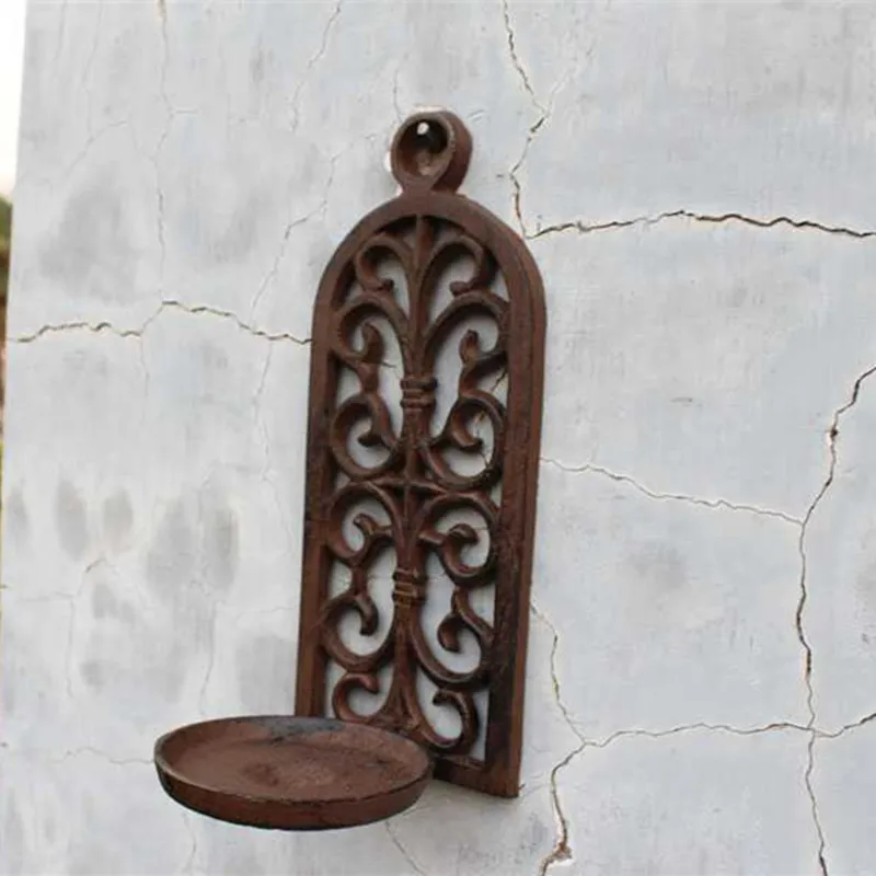 

Pierced wall uropean Old Vintage Retro Casting Iron Candlestick Candle Holder Wall Mounted Home Wall Decoration Craft Garden