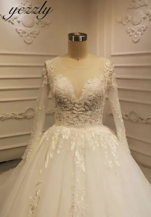 

Luxury Dubai Long Sleeves Lace Appliques Crystal Wedding Dress With Buttons Plus Size Ball Gown Princess Wedding Dresses Mariage