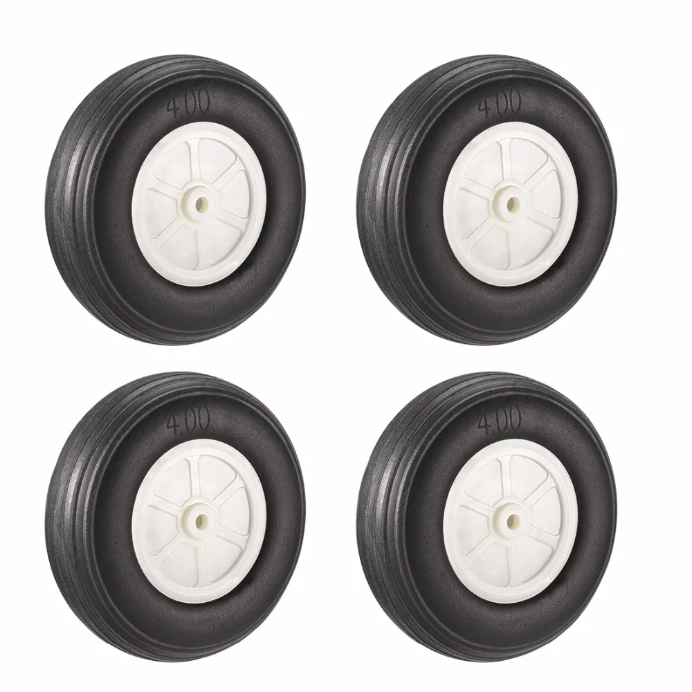 

UXCELL Hot Selling 4pcs 100mm Dia. 30mm Thick White Plastic Hub Black Foam Wheel Toy Car Wheel for RC Remote Control Airplane