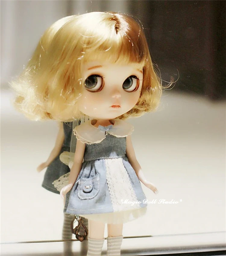 muñeca de cabeza grande