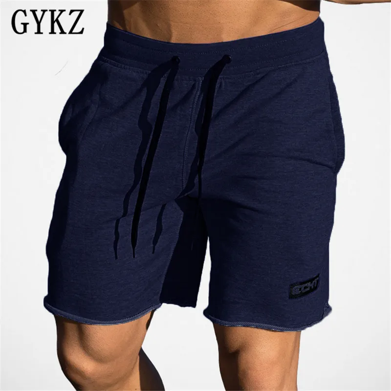 Gykz новые спортивные залы спортивные шорты Для мужчин бермуды Для мужчин с коротким homme 3 цвета Повседневное брендовая одежда письмо упругие
