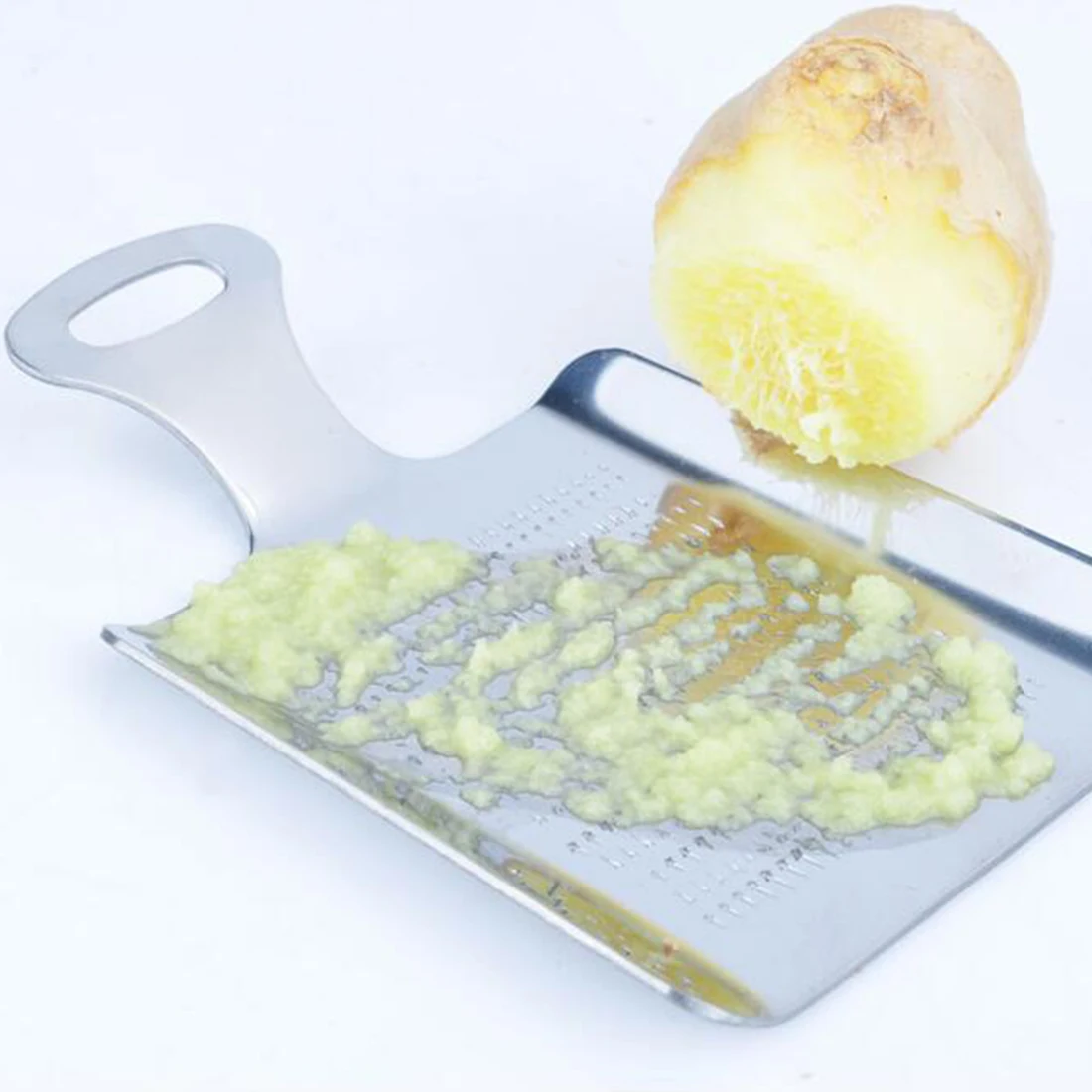 

Great 11cm*7cm*1mm Stainless Steel Kitchen Gadgets Fruit Food Grinder Crushed Cracker Garlic Device Garlic Grinding Tool