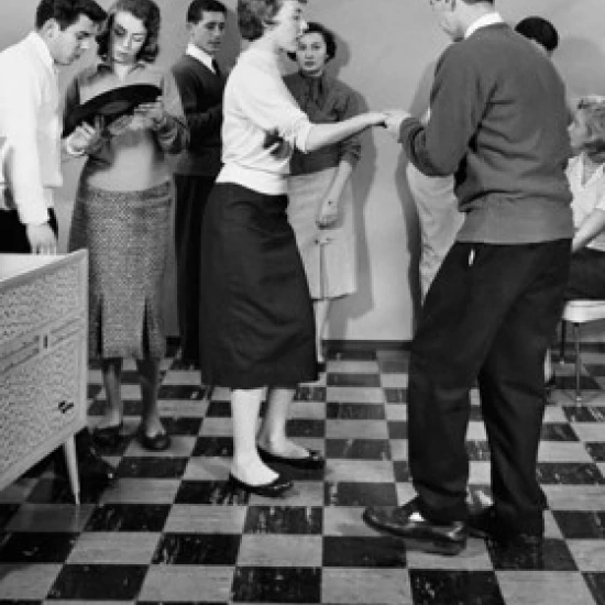 Teenagers dancing at party Poster Print (24 x 36)