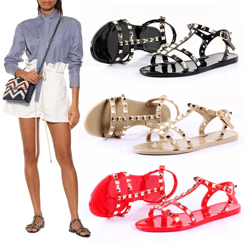 

2019 New Rivet Sandals Summer Female Flat Bottom Slip European And American Roman Shoes Buckle Beach Shoes Jelly Shoes