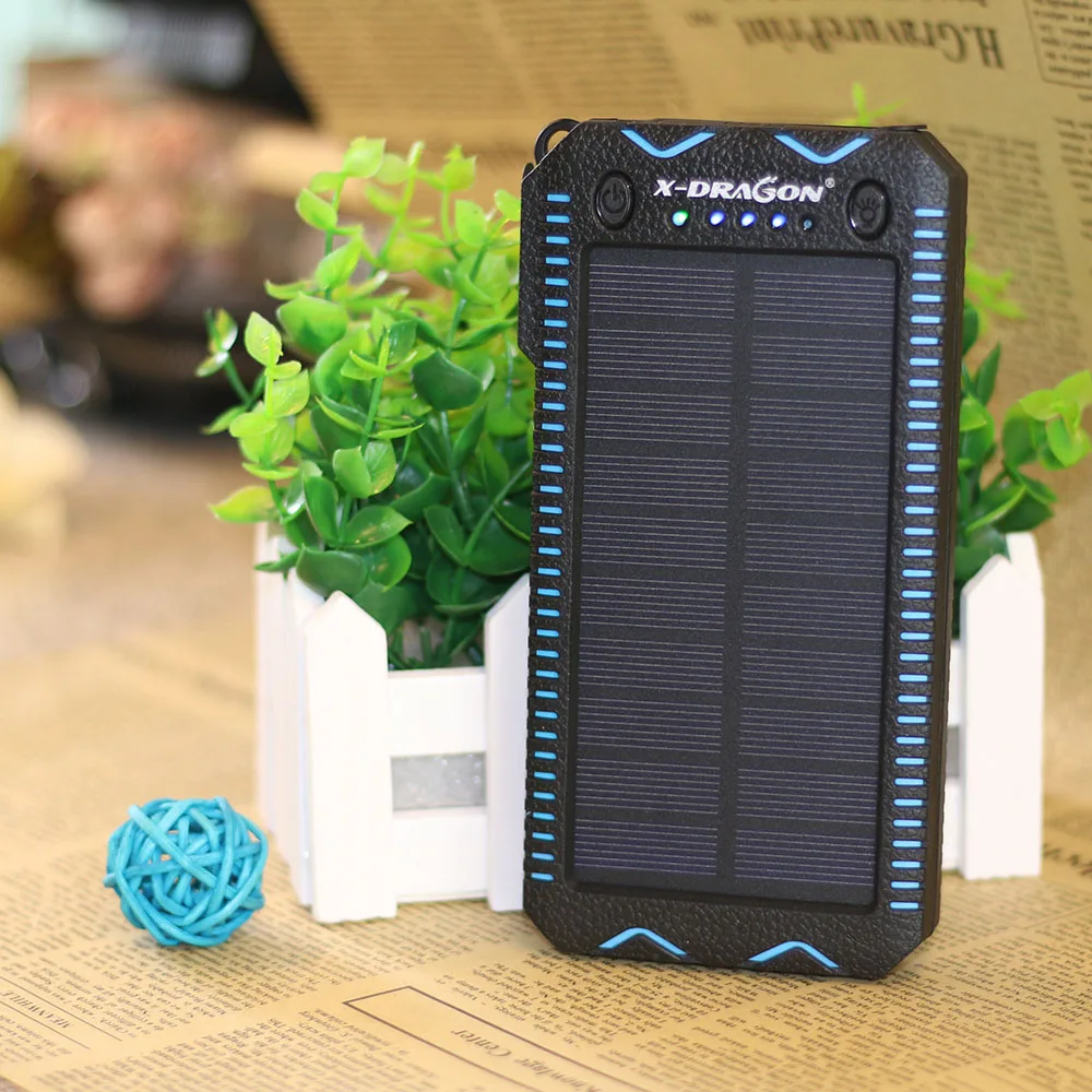 X-DRAGON Waterproof Solar Power Bank 15000 mAh Portable Solar Charger with Cigarette Lighter, SOS Strobe LED Lighting. X-DRAGON Waterproof Solar Power Bank 15000 mAh Portable Solar Charger with Cigarette Lighter, SOS Strobe LED Lighting.