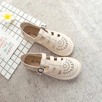

2019 spring and summer new carved hollow sandals casual wild Roman wind flat women's shoes