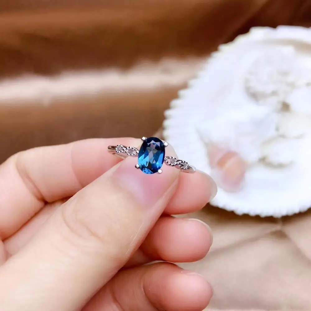 

Natural topaz gemstone for women with silver blue colour