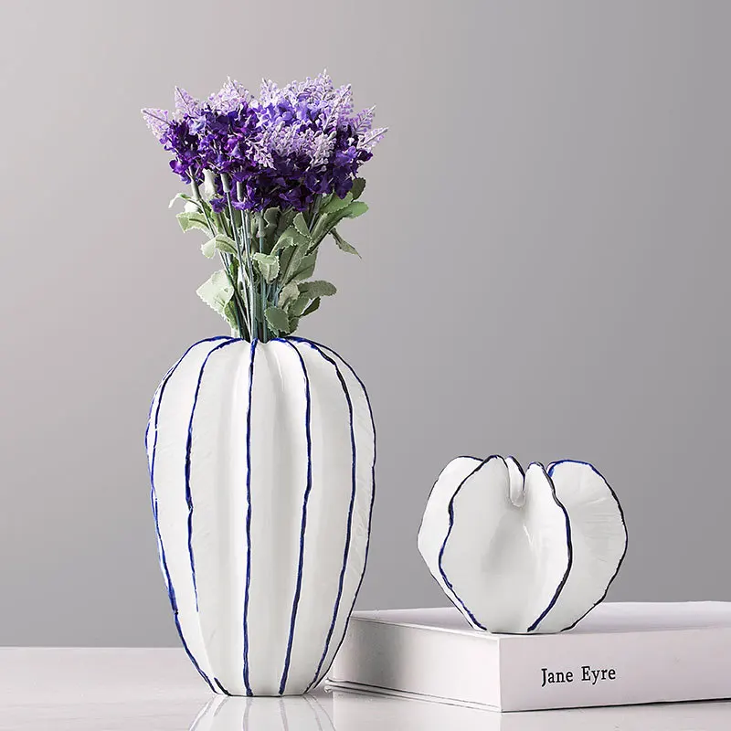 

INS white ceramic art carambola shape flower vase ornament home decor handicraft porcelain figurines room decoration accessories
