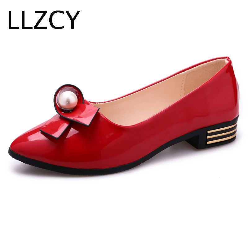 red flat shoes with bow