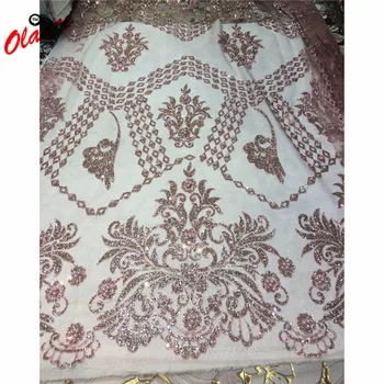 

Latest Peach pink color glued glitter lace with beads Mysterious Nigeria pattern JX0 free shipping African Tulle lace Fabric