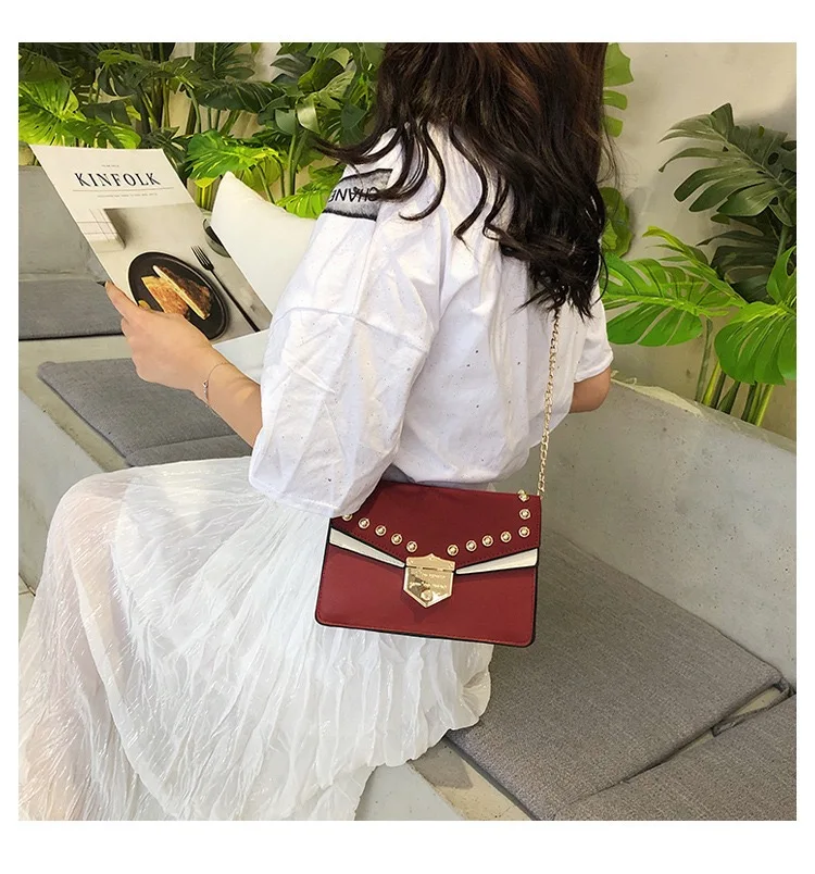 Retro rivet bag design sense lady bag clamshell PU leather lady crossbody bag chain bag new bag