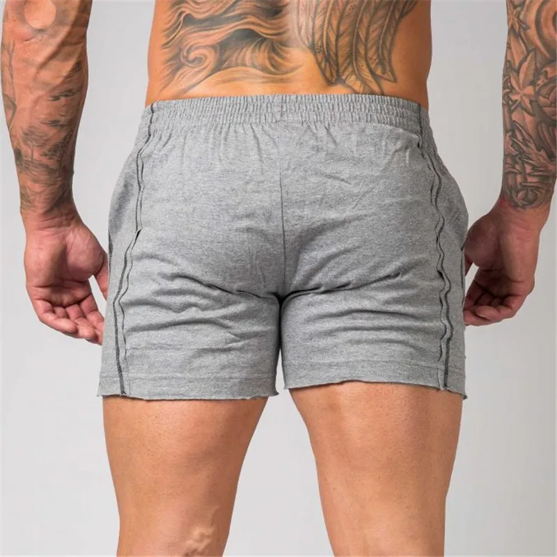 Мужские камуфляжные хлопковые шорты летние пляжные крутые короткие мужские брюки тренажерные залы фитнес тренировки Бодибилдинг; бег спортивная одежда