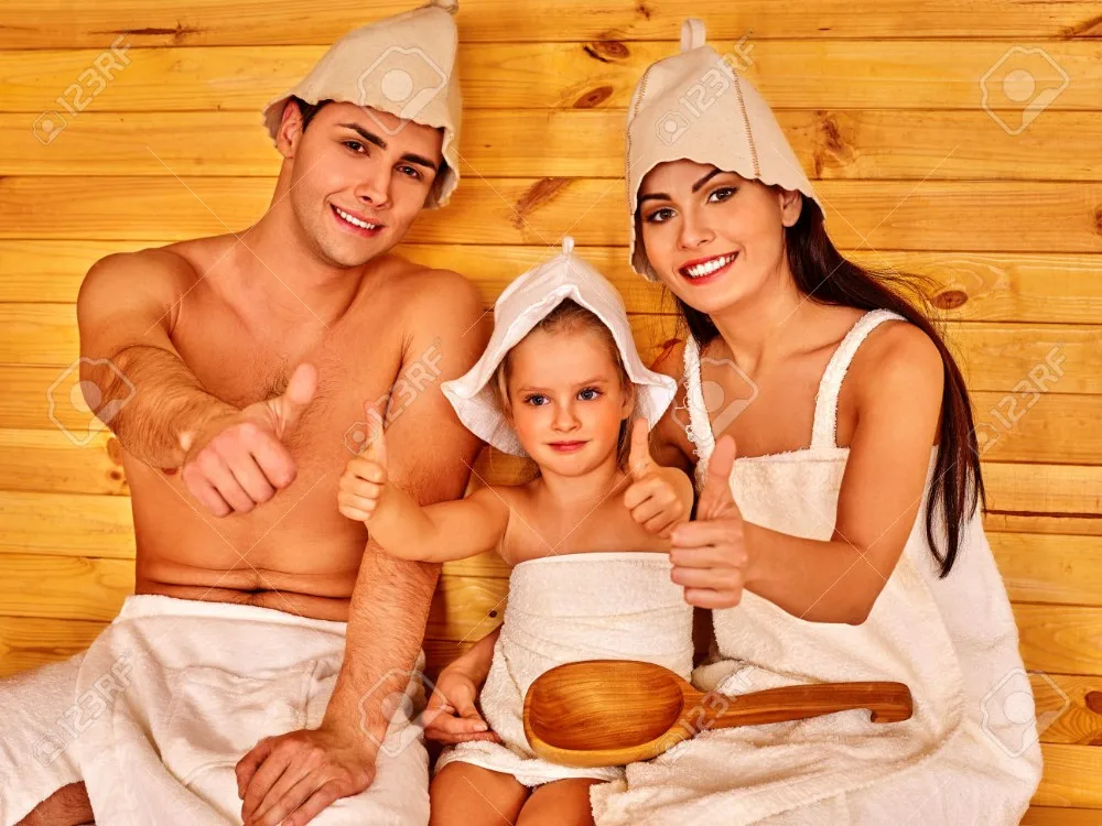 39838172-Family-of-three-persons-in-hat-relaxing-at-sauna-and-showing-thumb-up--Stock-Photo