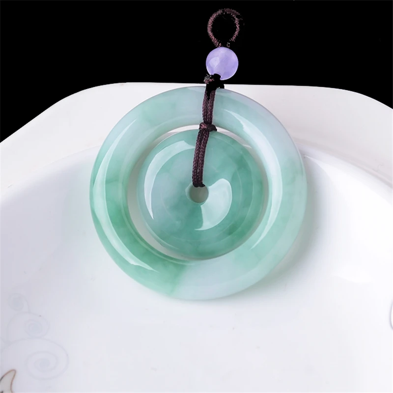 

TJP Jade pendant peace buckle Hand carved Size 27.3*7.6 mm Accompanied by a certificate 19041006 And lanyard