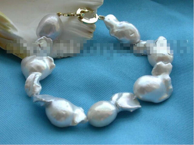

Free shipping >>>>>>8.5" Natural White 28mm Reborn Keshi Pearl Bracelet 14KGP