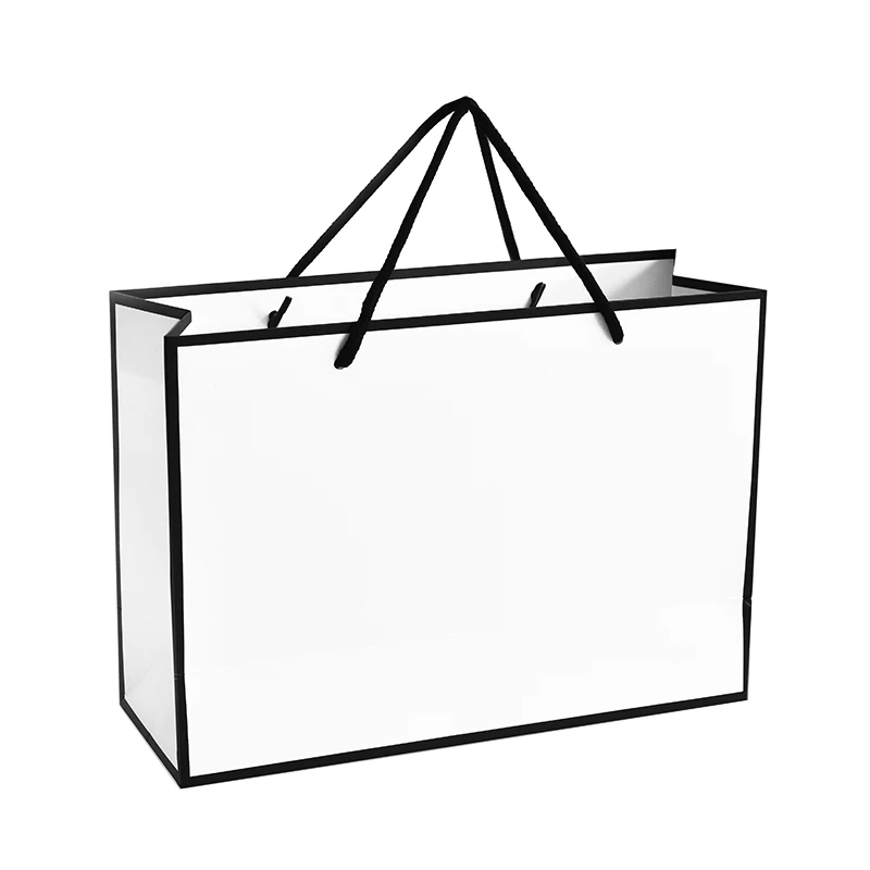 

10pcs/lot large New Creative design Black border White kraft paper bag with handle Wedding Party Favor Paper Gift Bags