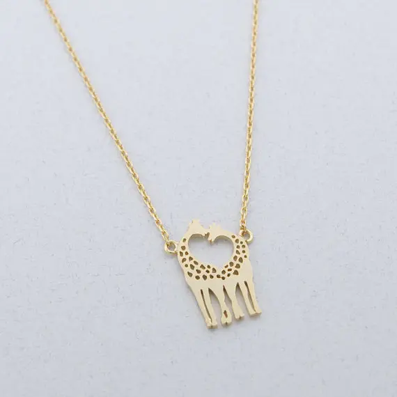 Gold Silver Loving Giraffes Necklace.jpg