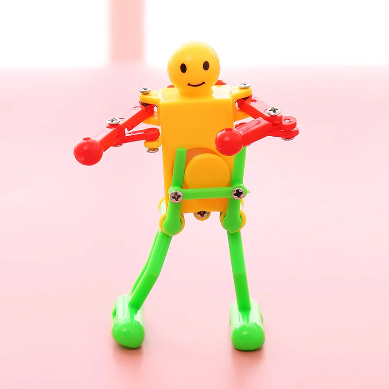 

3Pcs/Pack Dancing Robot Toy Plastic Clockwork Spring Yellow Green Red Wind Up Dancing Robot For Children Kids Toy Gifts